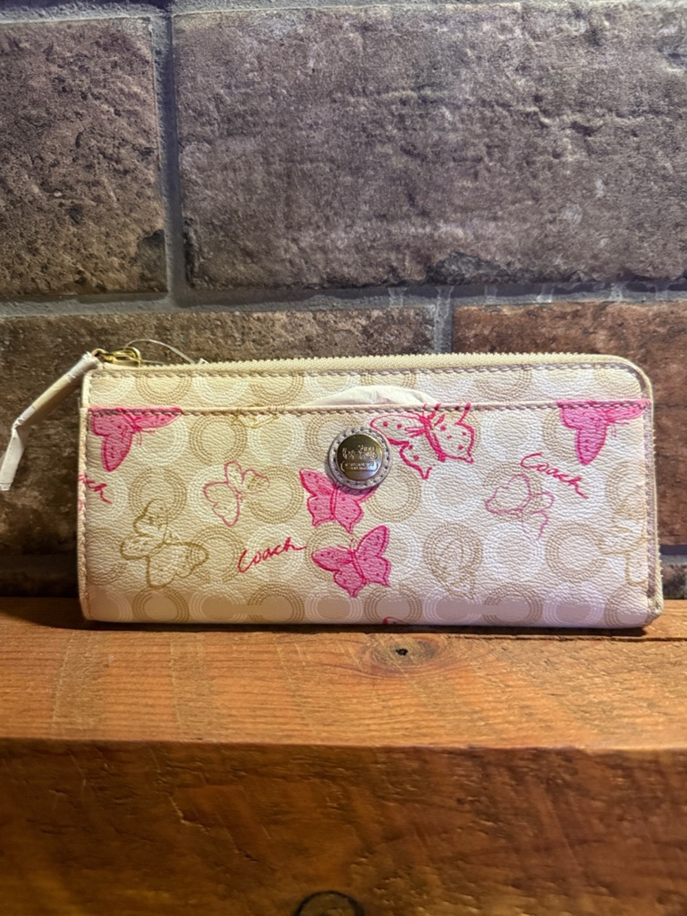 Coach Cream Wallet with Pink Butterfly Accents